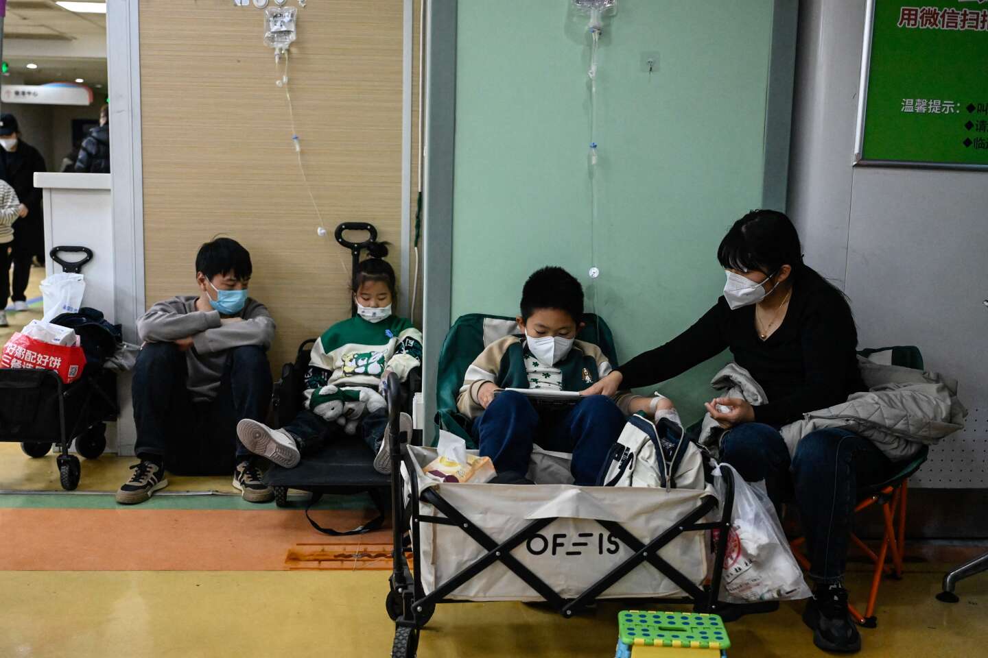 In northern China, hospitals are overwhelmed by an outbreak of respiratory illnesses